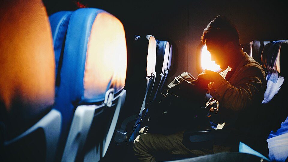 Airplane Window (Unsplash)